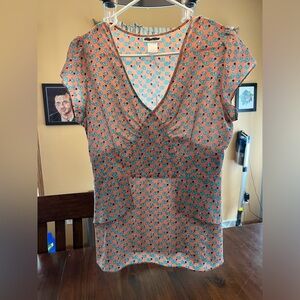 Peach blouse with blue elephant designs